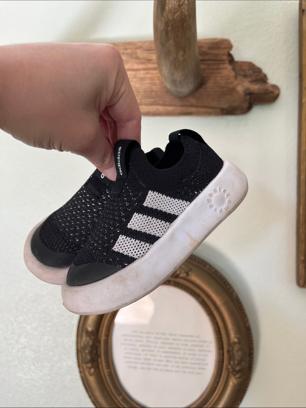 Toddler Adidas slip on black and white sneaker